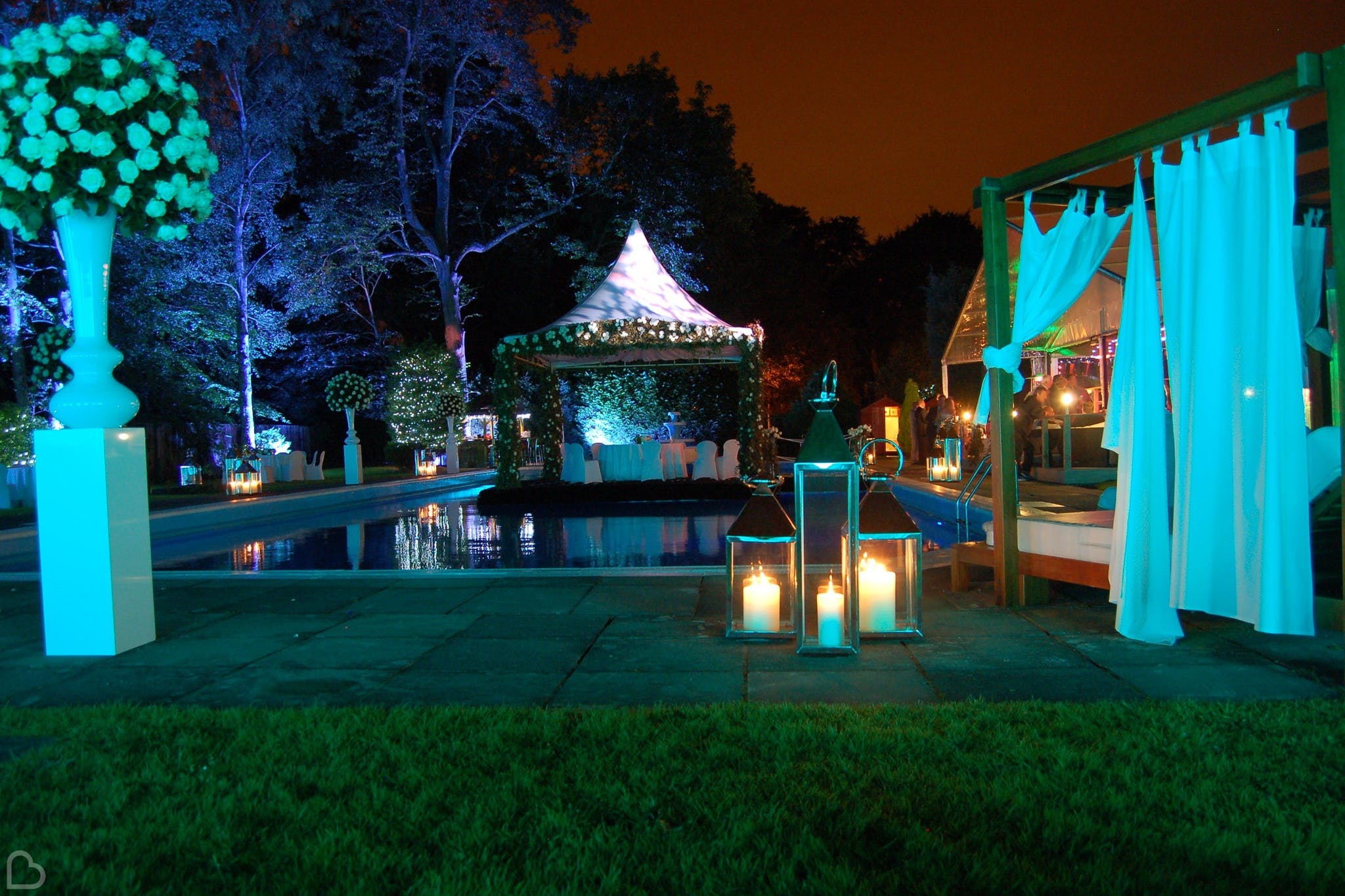 outside of kings oak hotel, a wedding party is about to happen with flowers and marquee set up