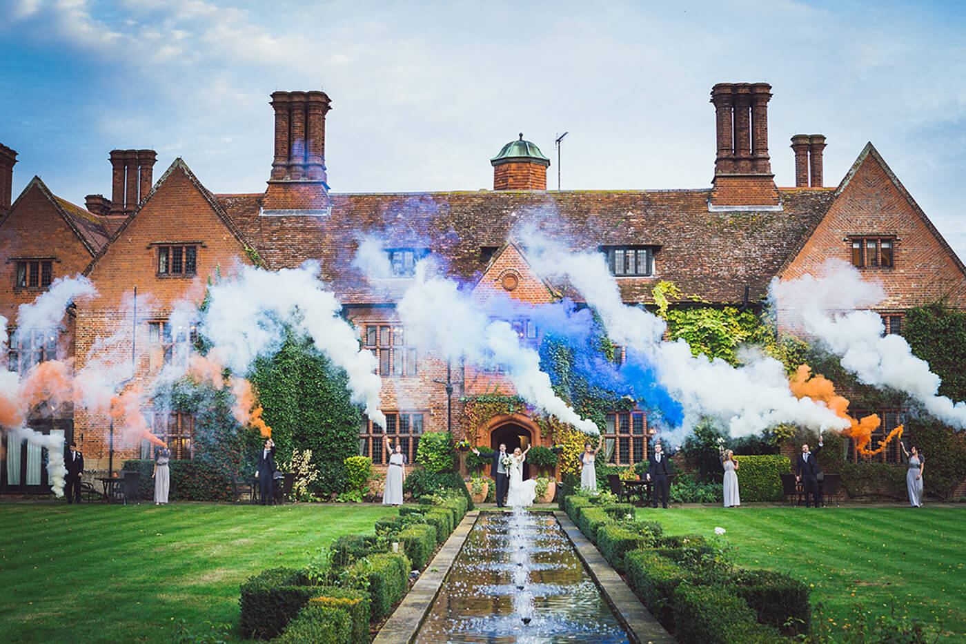 guests standing in front of manor house