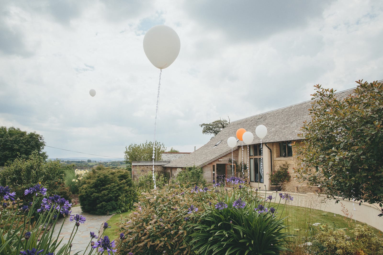 South West | Devon | Hittisleigh | Spring | Boho | DIY | Outdoor | White | Orange | Barn | Real Wedding | Helen Lisk Photography #Bridebook #RealWedding #WeddingIdeas Bridebook.co.uk 