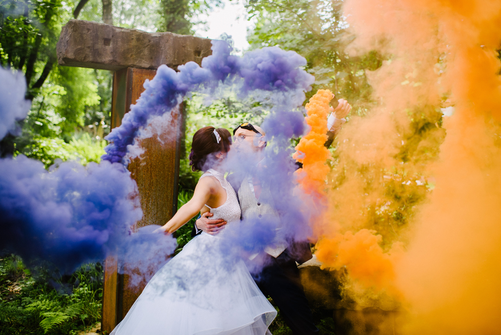 bridebook.co.uk rocknroll bride rw couple with smoke bombs