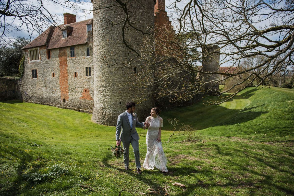 Faye and Adam Hughes in the church getting married