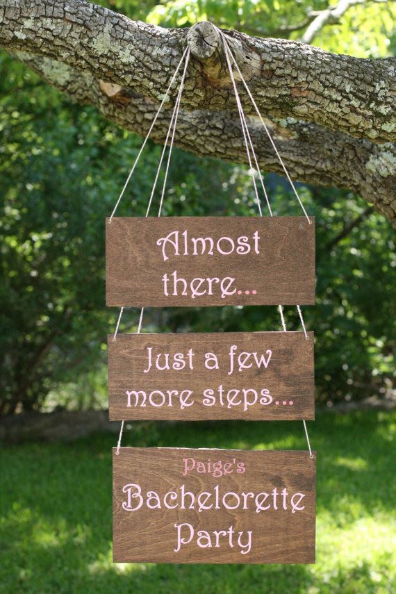 Bridebook.co.uk- wooden sign pointing to the bachelorette party