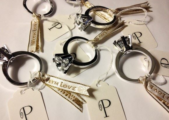 Bridebook.co.uk- plastic engagement ring favours