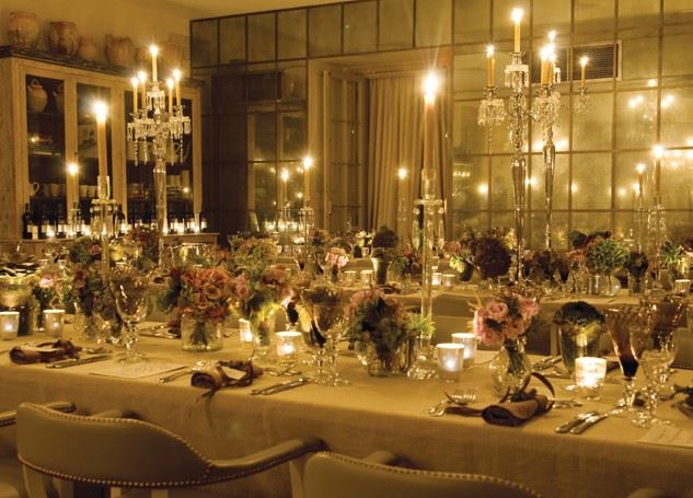 Bridebook.co.uk- wedding breakfast lit up with candles