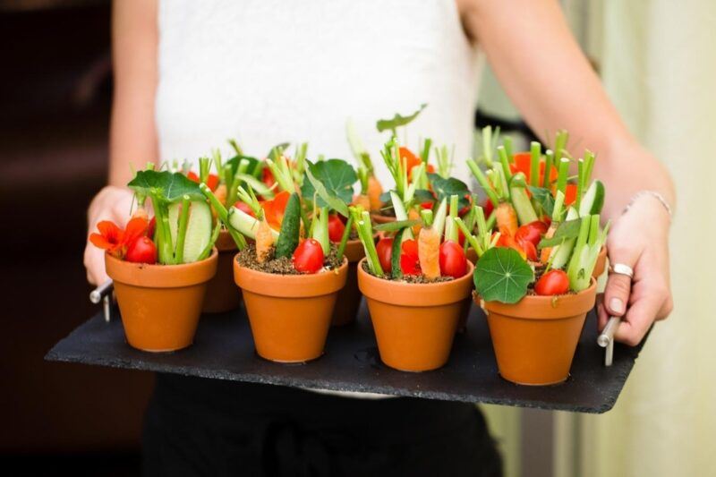 Bridebook.co.uk- vegetables in little pots at wedding reception