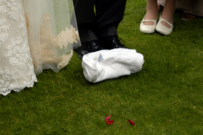 Traditional Jewish wedding breaking the glass