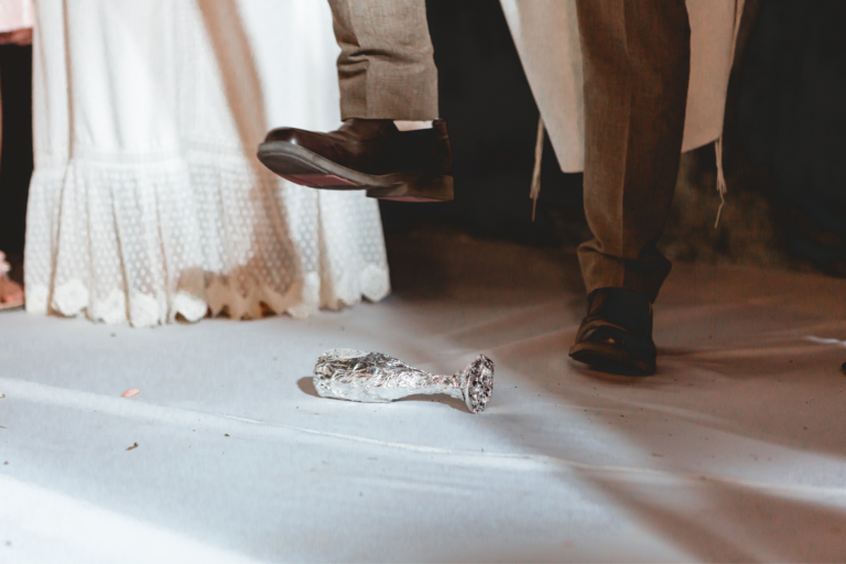 Traditional Jewish wedding breaking the glass