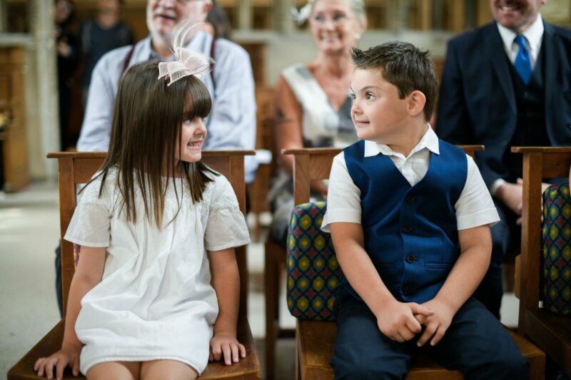 Page boy and flower girl in a church
