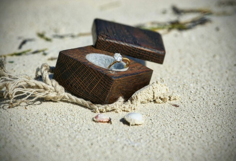 Engagement ring on a beach