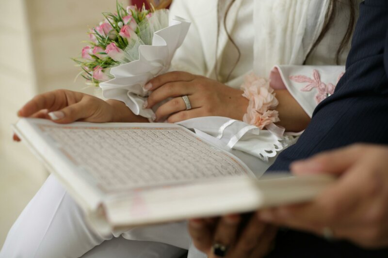 Couple reading a wedding guest book
