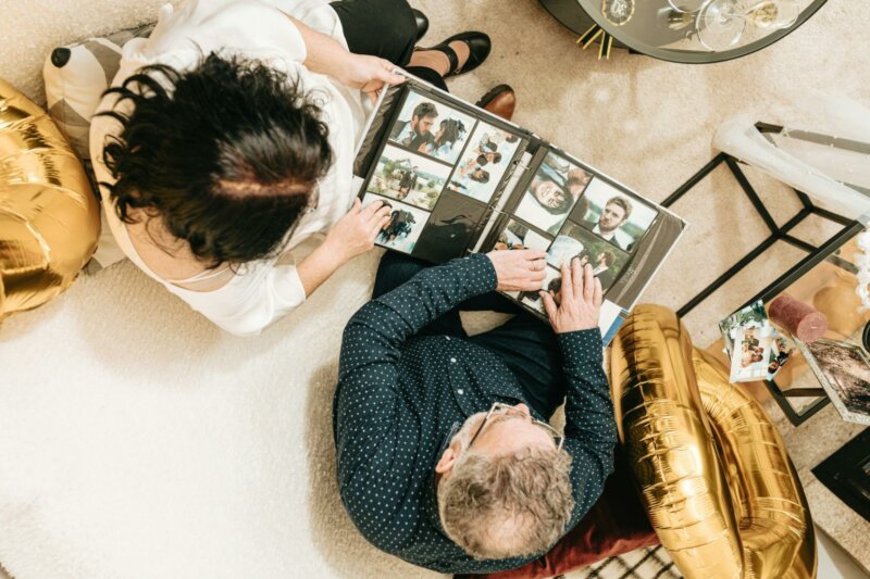 Couple looking at a wedding album