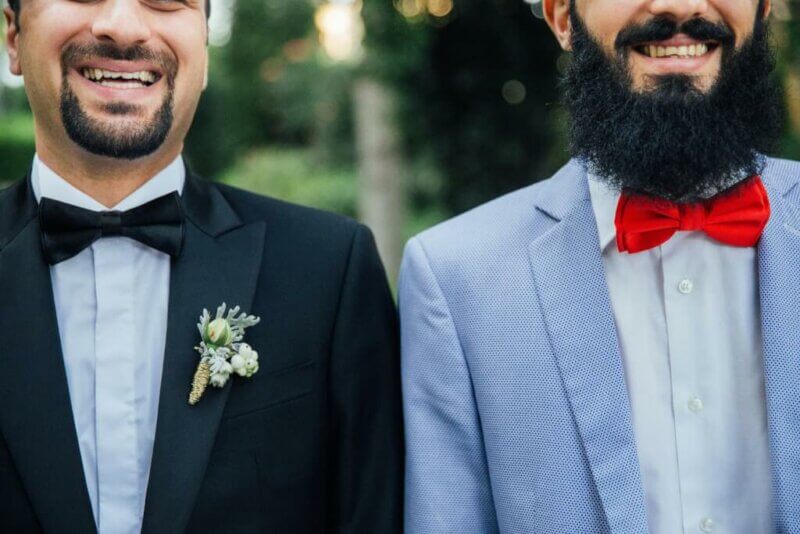 Two men in a tux