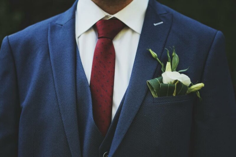 Suit and red tie