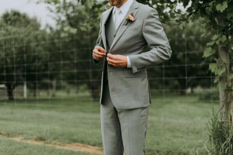 Groom in a grey suit