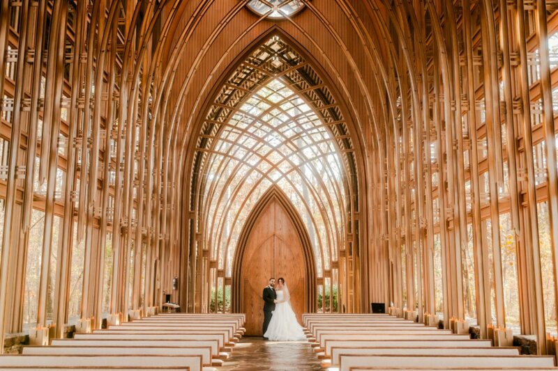 Married couple in a wood cathedral