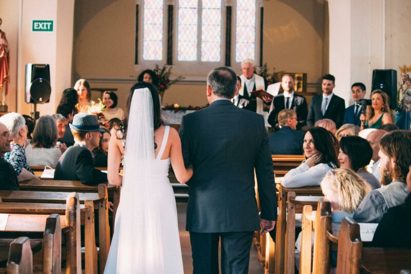 Bride walking down the aisle with her father
