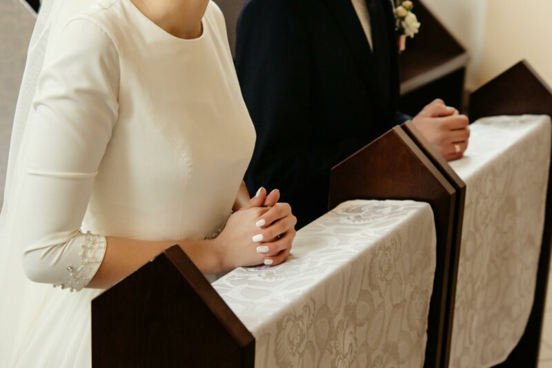 Bride and groom praying