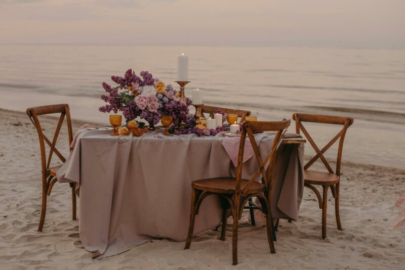 Wedding table on a beach at sunset
