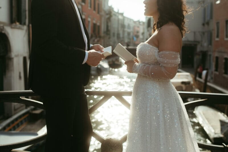 Couple exchanging vows on a bridge