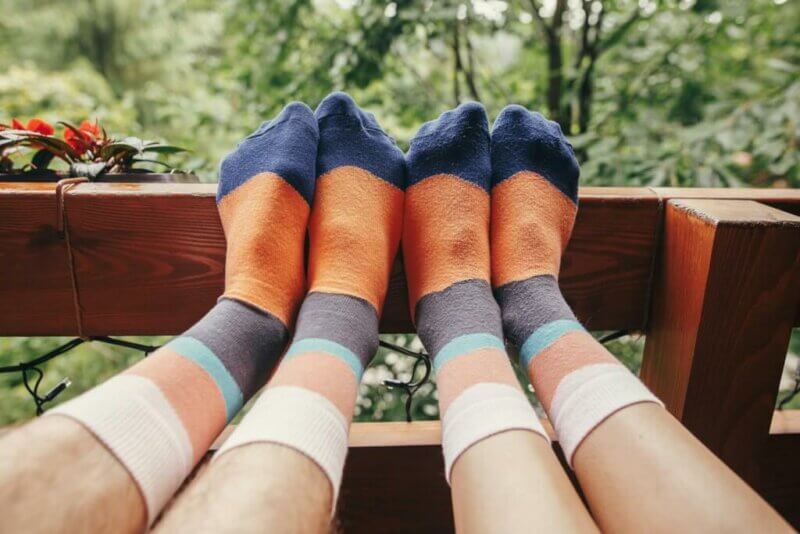 Couple wearing the same socks