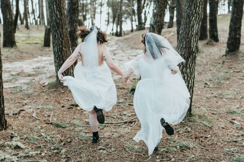 Running brides in a forest