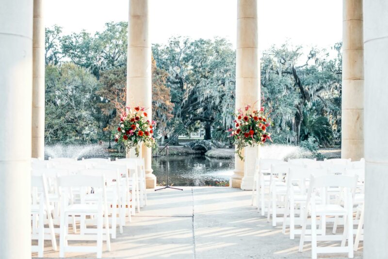 Wedding venue with white chairs and columns