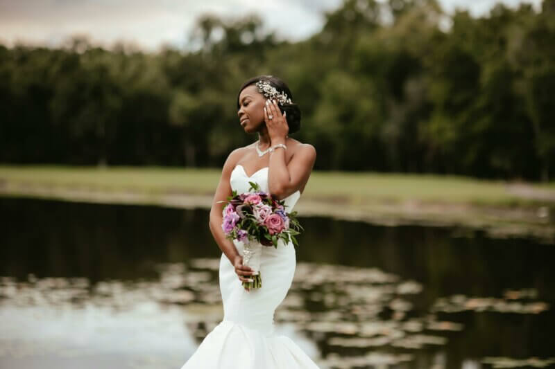 Bride by a pond